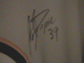 Joel's signature on a game worn Boston Bruins jersey of his.