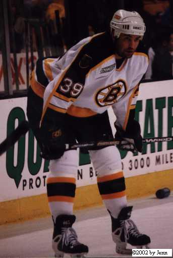 In game shot.  Joel playing for the Boston Bruins.